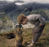 An adorable little boy, a curious marmot, and a dramatic landscape…