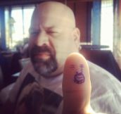 Self portrait on his thumb…