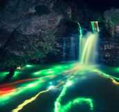 Long Exposure Of Glowsticks In A Waterfall