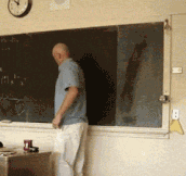 Teacher draws a perfect circle on a chalkboard…