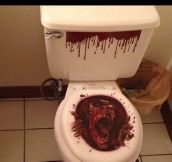 Scary toilet seat cover…
