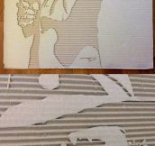 Carving portraits into cardboard…