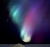 An igloo under the Northern Lights…