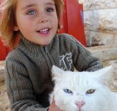 Afghan girl and her cat…