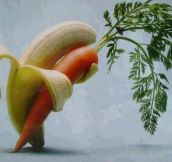 A banana, tenderly holding a carrot…