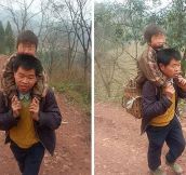 Chinese Father Carries His Disabled Son 18 Miles To School Every Day