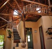 My friends built this house out of local trees, mud, and cow dung. Traditional Kenyan architecture with a modern twist