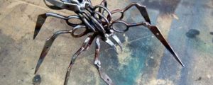 A Spider Completely Made Out Of Scissors