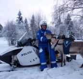A Finnish Police Man With His Police Reindeer