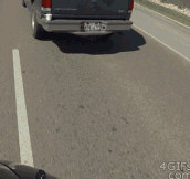 Driver Mugged By A Passing Motorcyclist