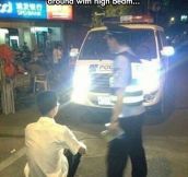 Chinese Police Punishing High-Beam Offenders