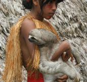 An Amazonian Girl and Her Pet Sloth