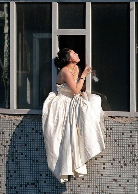 image0015 Man Saves Bride Jumping From Top Story Window