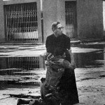 Priest. Shot soldier. 1000 words.