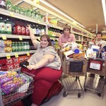 Susan Eman and her two sons stock up for that day's meal.