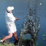 Golfer frees Wolfman from water