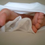 Taking off your socks right before getting into bed
