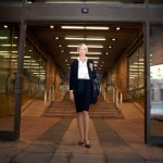 Businesswoman by Entrance