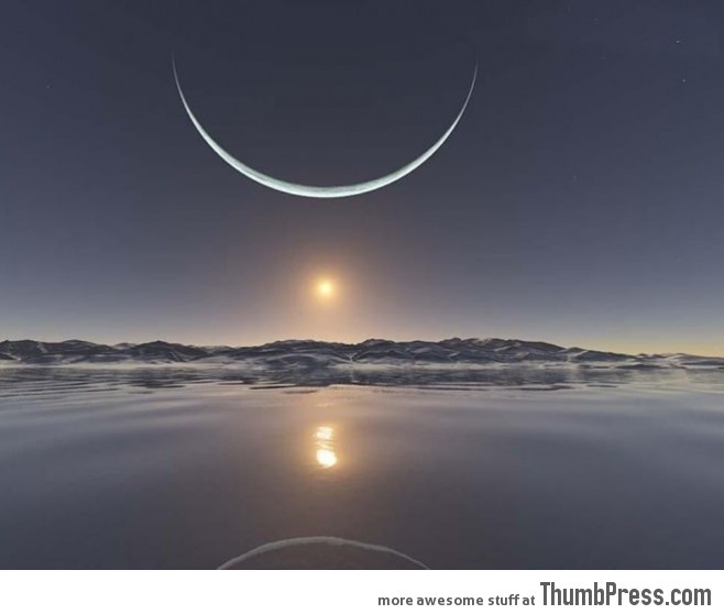 Sunrise at the North Pole With the Moon at its Closest Point