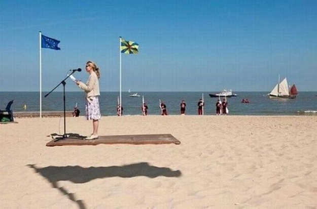This woman is not levitating on a floating platform.