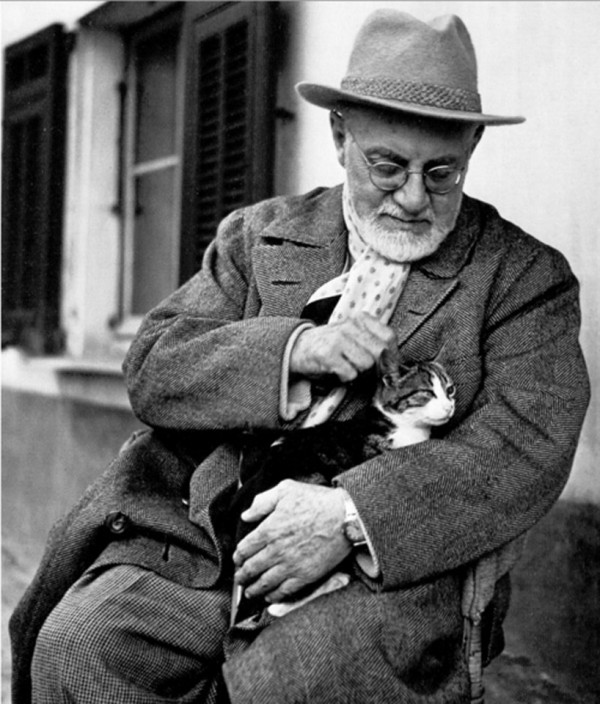 Artist Henri Matisse and his cat Minouche