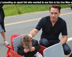 Robert Downey, Jr. Consoling an upset kid who wanter to see him in his Iron Man suit...