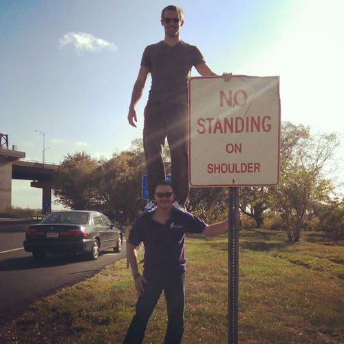 funny-stand-shoulders-guys-sign