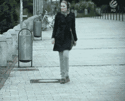 funny-gif-girl-dance-suitcase-street