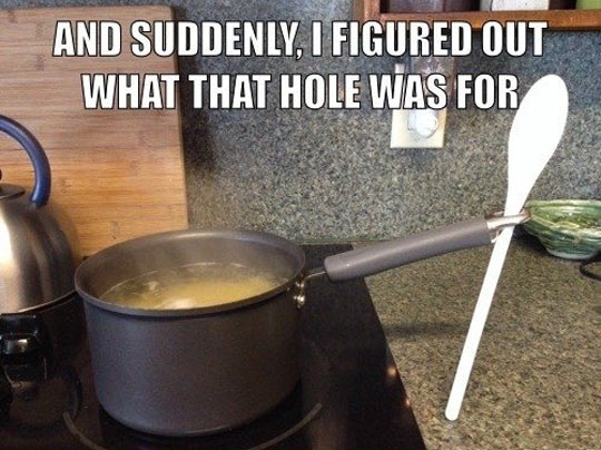 funny-pot-spoon-holding-noodles-kitchen