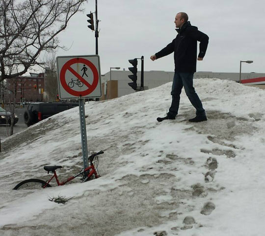 funny-defying-sign-bicycle-man