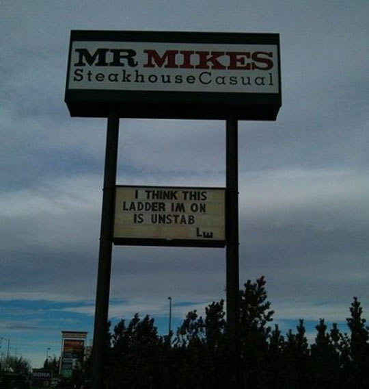 funny-sign-ladder-steakhouse-clouds