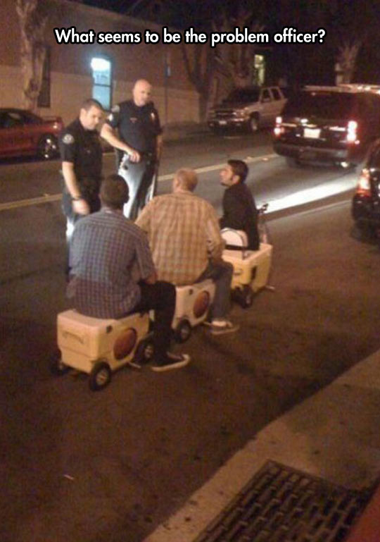 funny-men-toy-car-police-officer