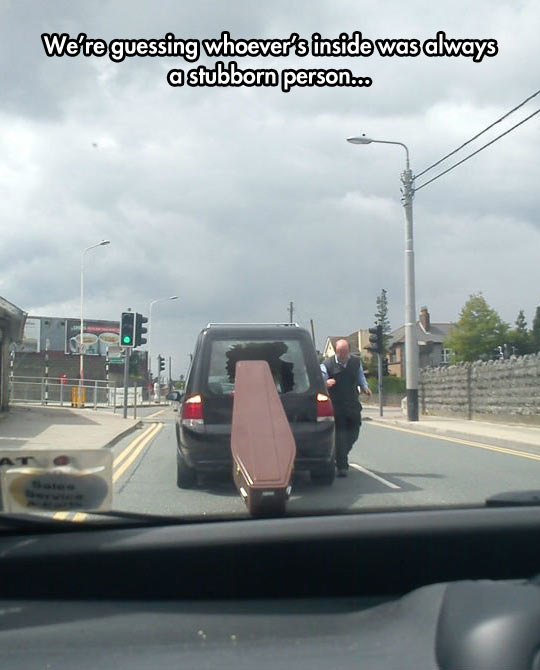 funny-coffin-car-funeral-glass-break