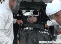 funny-gif-alien-prank-street-hazard-suit