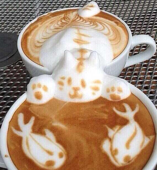 Coffee Art In Two Mugs
