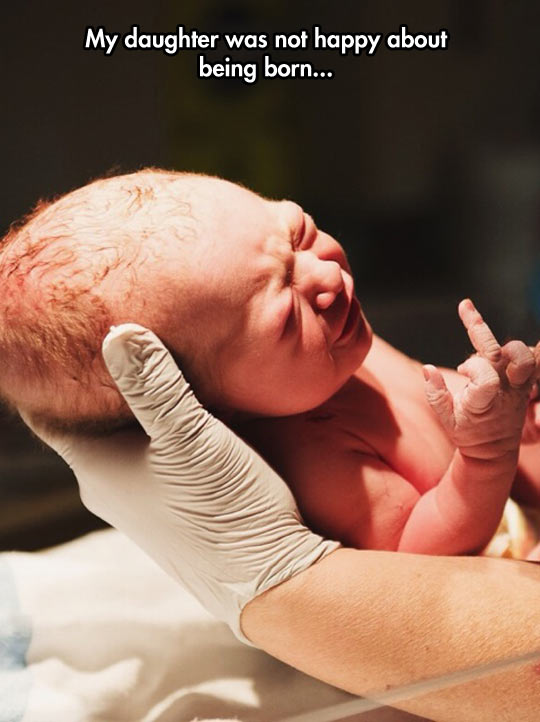 funny-newborn-baby-crying-hand