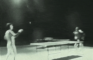 Bruce Lee Playing Ping Pong With Nunchucks