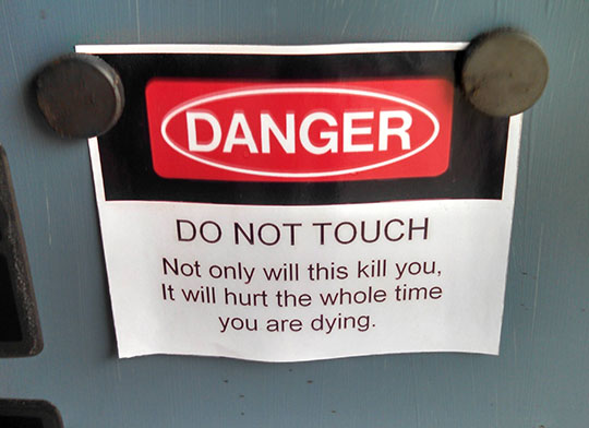 funny-danger-sign-hurt-warning