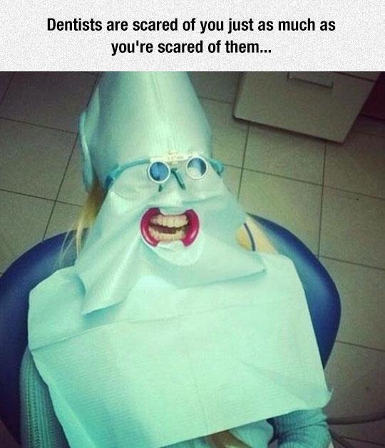 funny-dentist-woman-teeth-mask-covering