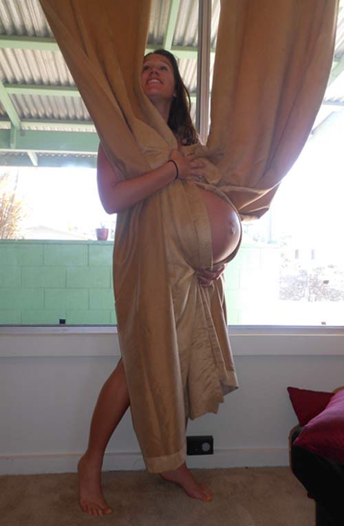bad-pregnancy-pics-stomach-wrapped-curtains