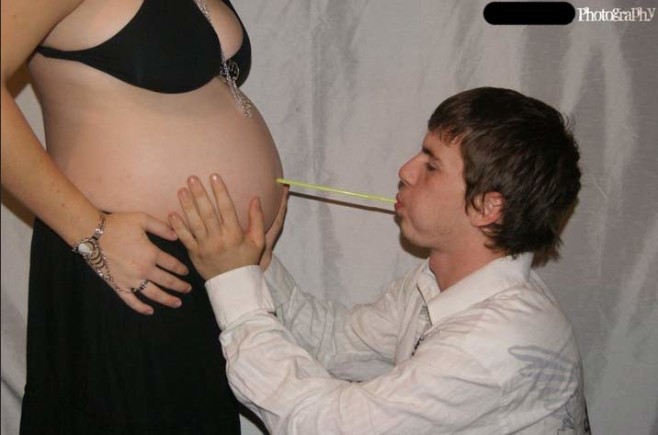 funny-awkward-pregnancy-photos-straw-stomach-blow
