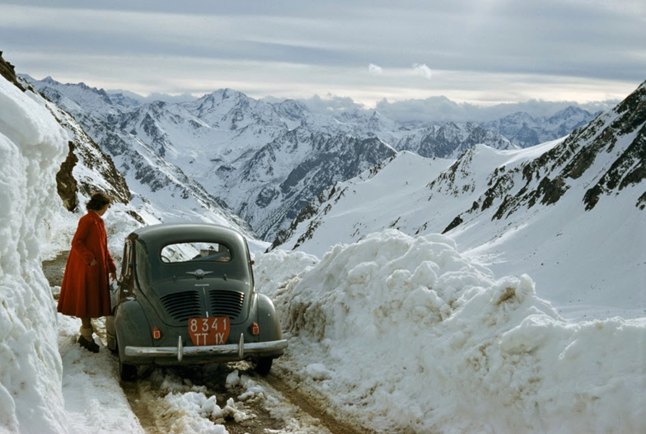A woman surveys a treacherous mountain pass in the Pyrenees of France