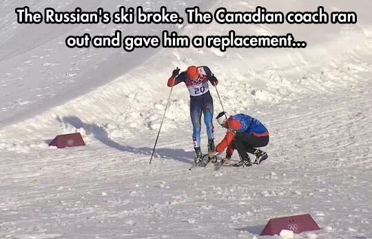 Canadian coach helping out a Russian during a race…