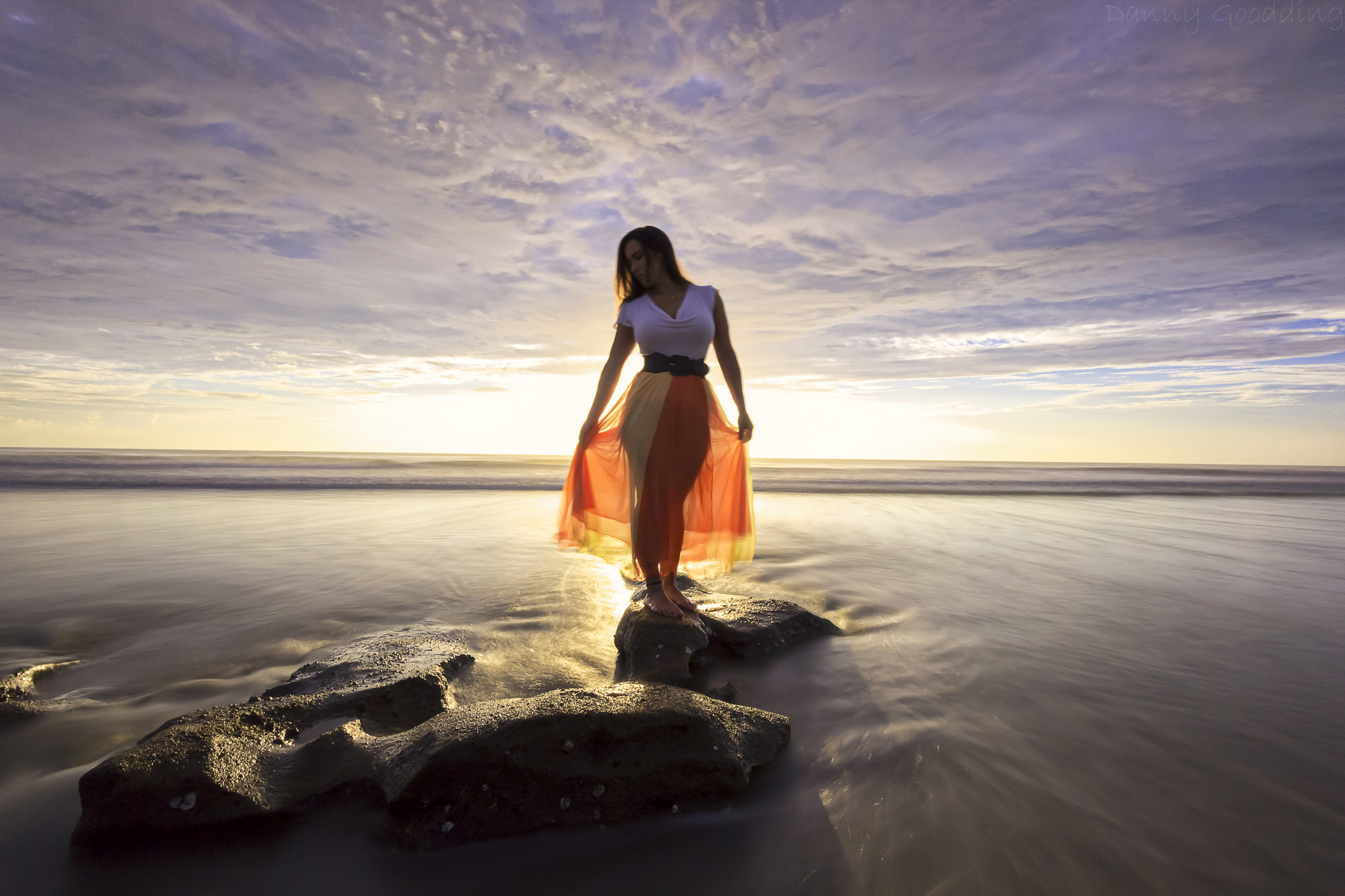 A Long Exposure Of My Wife Standing On Some Rocks By The Ocean During ...